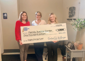 From left, FFBLA Senior Vice President and Senior Credit Analyst Mary Meyer, Family Justice Center Executive Director Wendi Powell, and Bank Officer and Branch Manager/Lender Natalie Kelly.