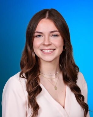 A professional portrait of Kamryn Owen
