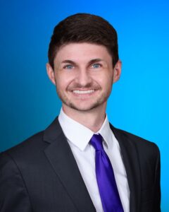 A professional portrait of Kyle Guillott-Creel
