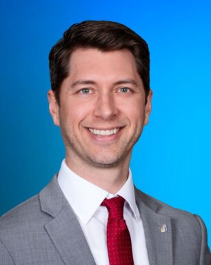 A professional portrait of business banker Logan Fontenot