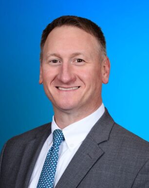 A professional portrait of business banker Will Henning