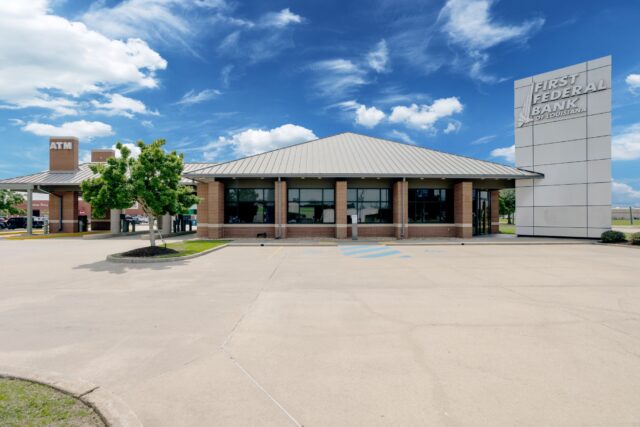 A ground level photo of the First Federal Bank of Louisiana Carlyss Branch located at 2940 Ruth St. in Sulphur, Louisiana.
