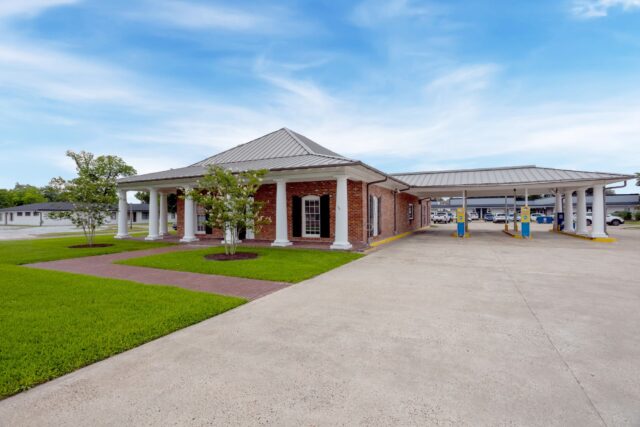 A ground level photo of the First Federal Bank of Louisiana McNeese Branch located at 324 E. McNeese St. in Lake Charles, Louisiana.