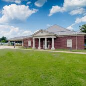 A ground level photo of the First Federal Bank of Louisiana Moss Bluff Branch located at 640 Sam Houston Jones Pkwy. in Moss Bluff, Louisiana.