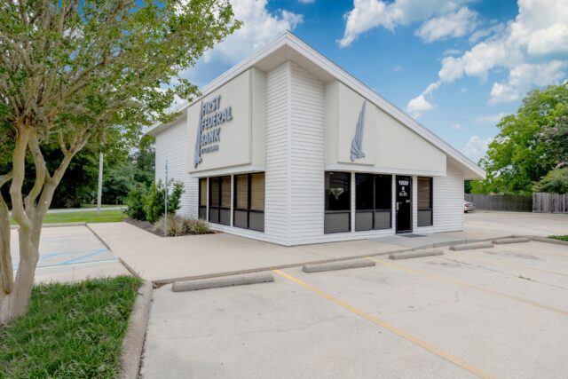 A ground level photo of the First Federal Bank of Louisiana Vinton Branch located at 1000 Center St. in Vinton, Louisiana.