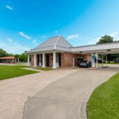 A ground level photo of the First Federal Bank of Louisiana Westlake Branch located at 2214 Sampson St. in Westlake, Louisiana.